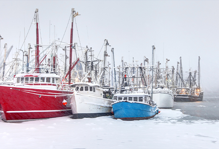 Ships on icy water